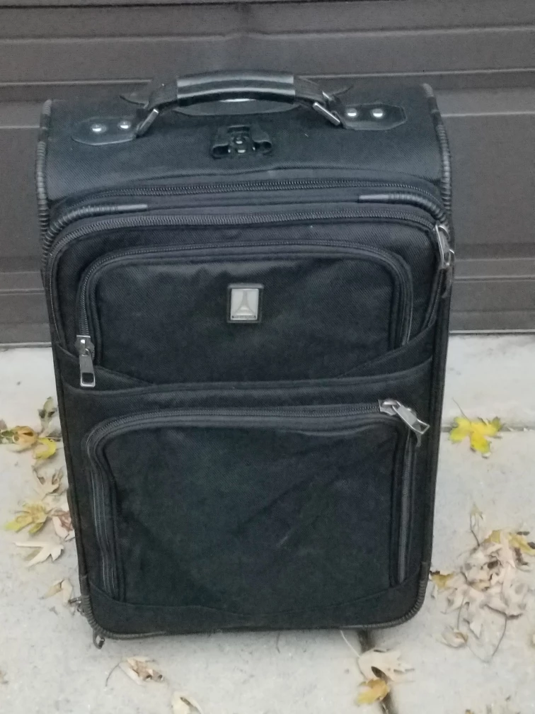 Travelpro Black Rolling Suitcase