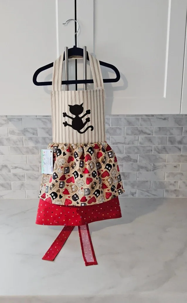 Handmade pinifore apron in a size 4/6