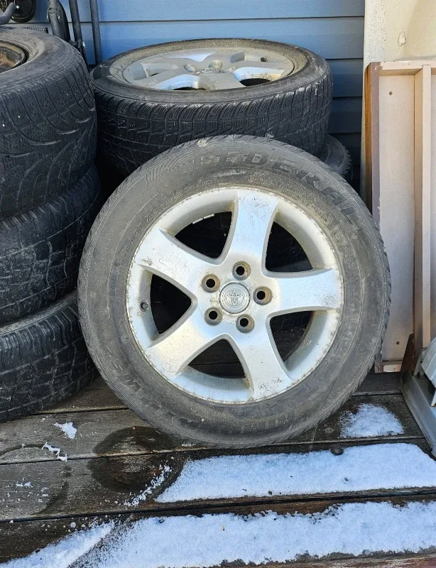 Four Toyota 15" Rims with Winter Tires 50% Tread Left image indicator(2)
