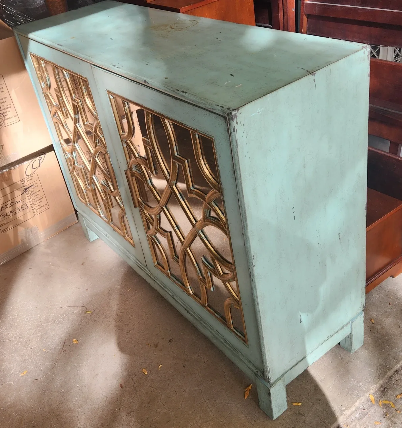 Cabinet with gold accents image indicator(6)