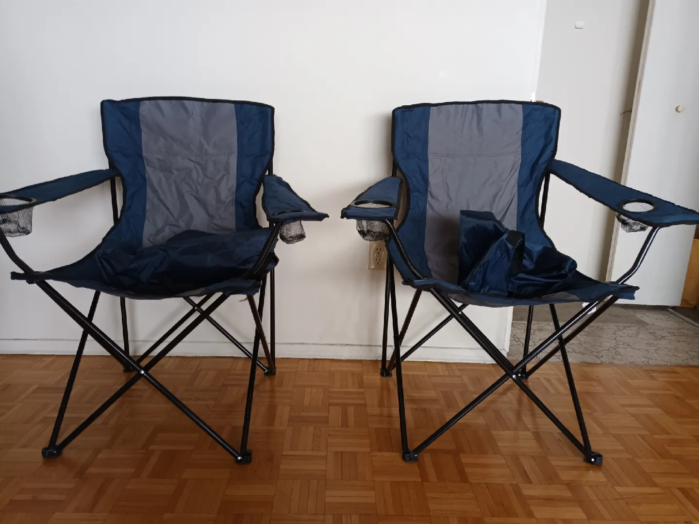 Selling 2 foldable camping chairs w Cupholder & Carrybags image indicator(2)