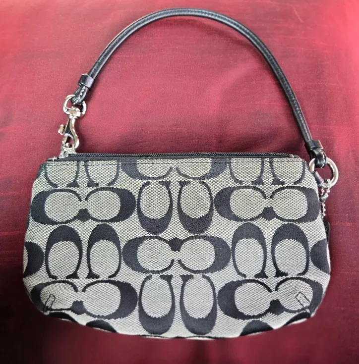 Coach Signature Wristlet/Clutch image indicator(2)