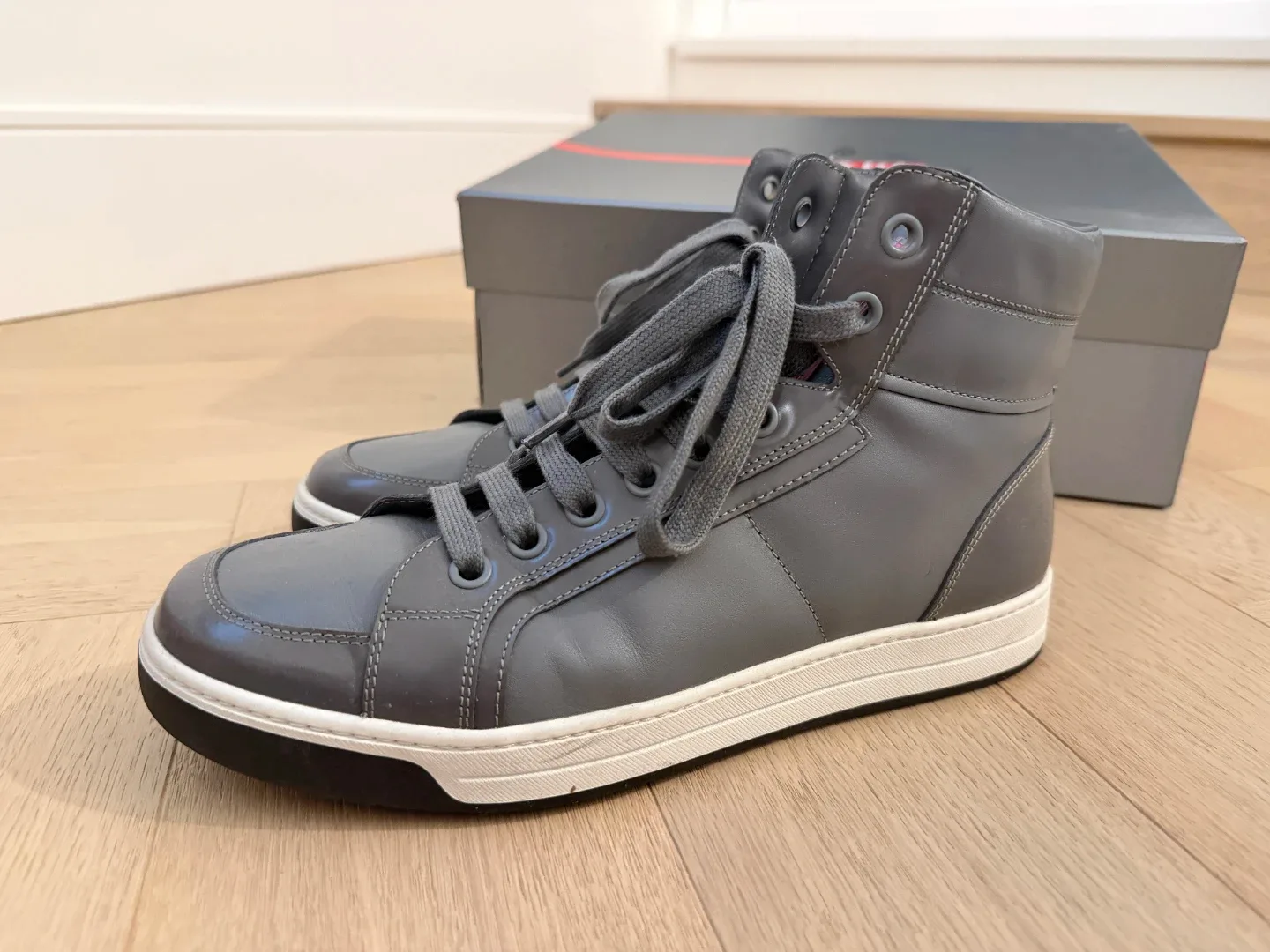 Prada Grey Leather High-Top Sneakers image indicator(2)