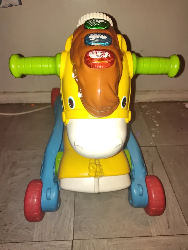 Fisher-Price Stroll Along Musical Pony Ride-On Toy