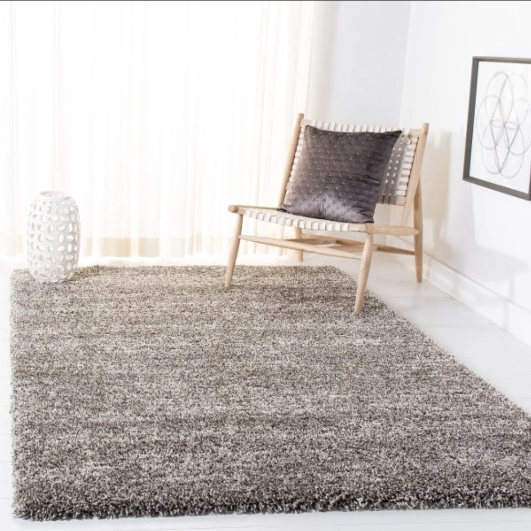 Used 8 x 10 ft Safavieh shag rug (grey) for $50