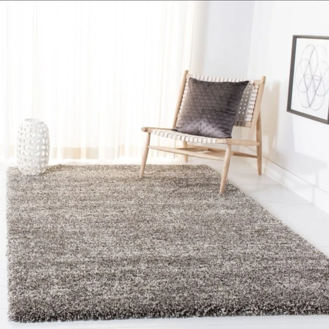 Used 8 x 12 ft Safavieh shag rug (grey) for $50