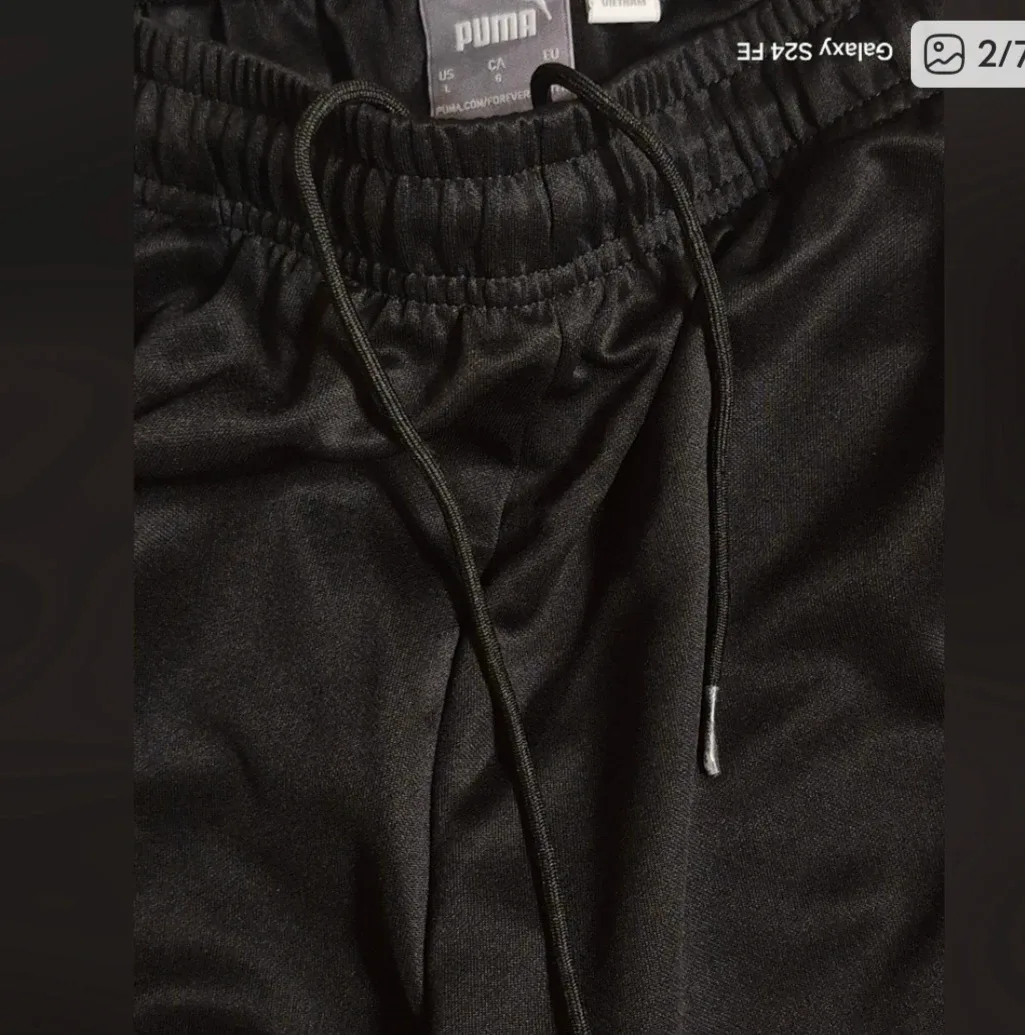 men's  puma track pants image indicator(2)