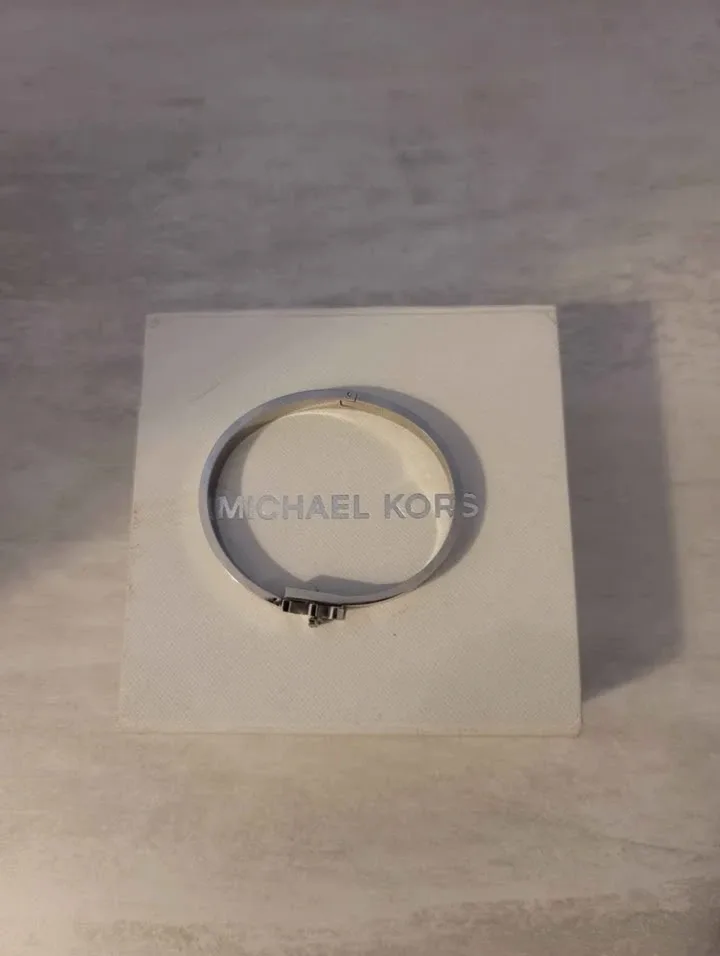 MK logo bangle bracelet in stainless steel with pavé crystals.  image indicator(4)