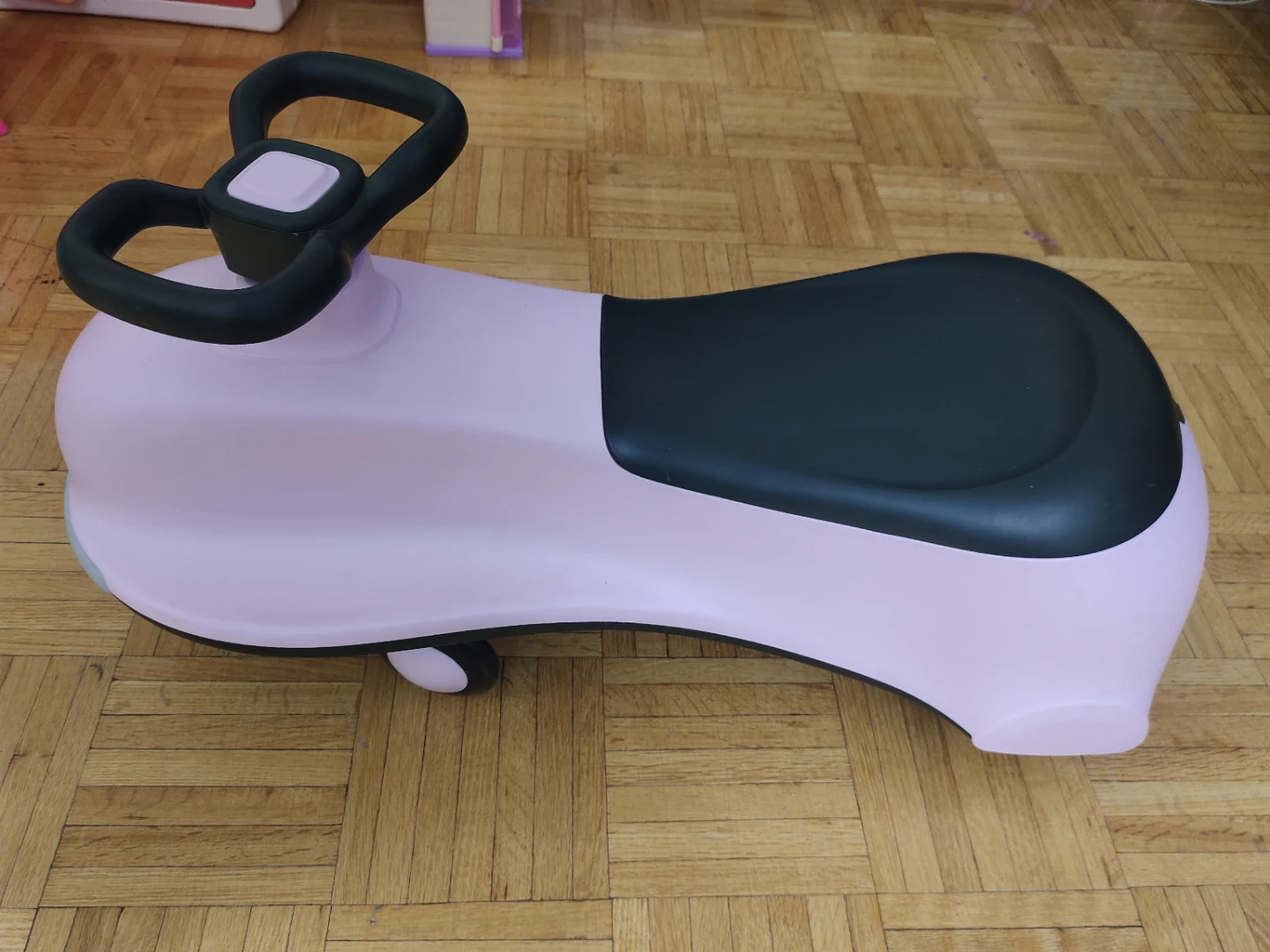 Hardly Used Pink Wiggle Car Ride-On Toy with LED flashing Wheels - photo 3
