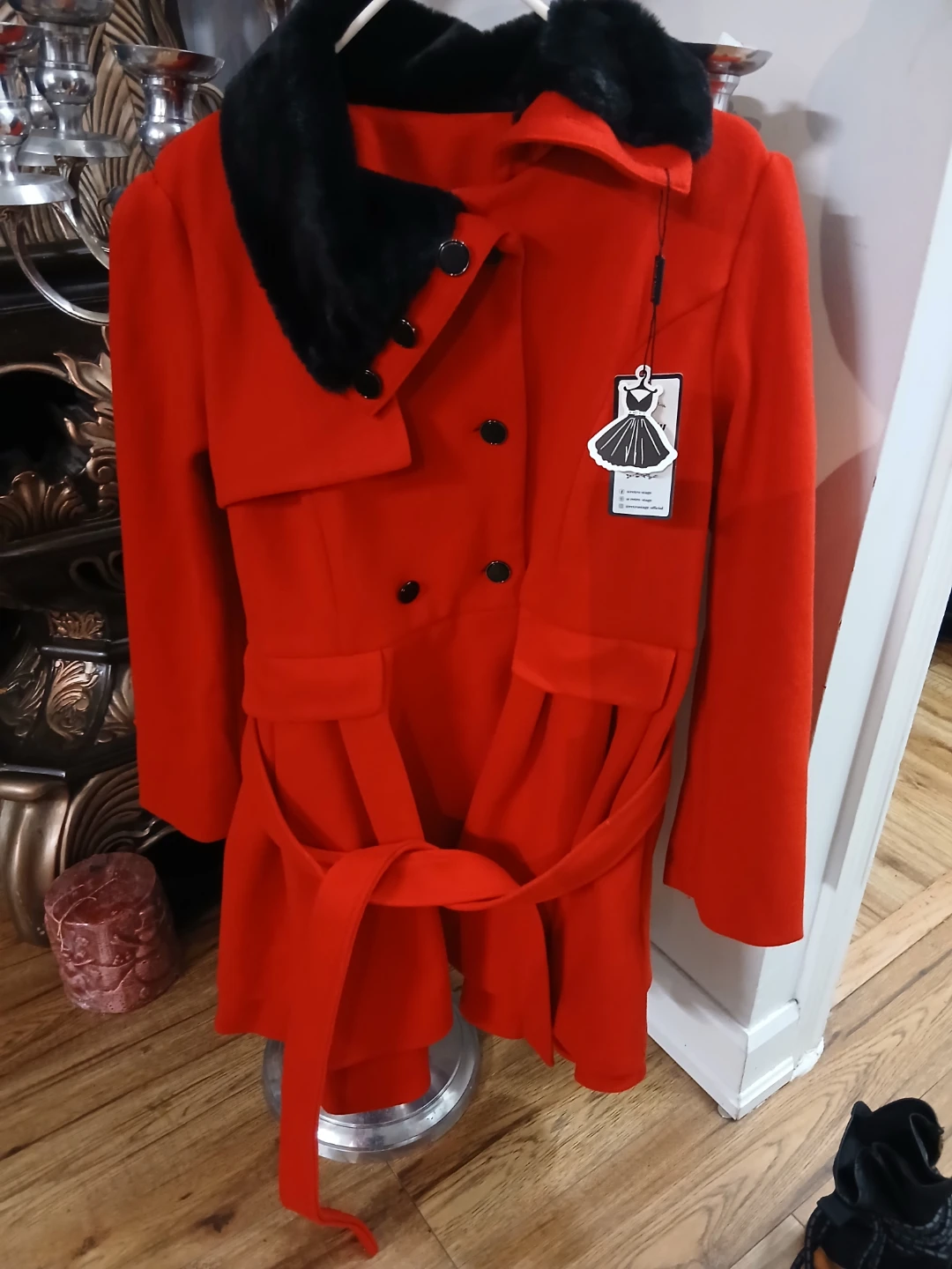 Red belted coat with fur collar