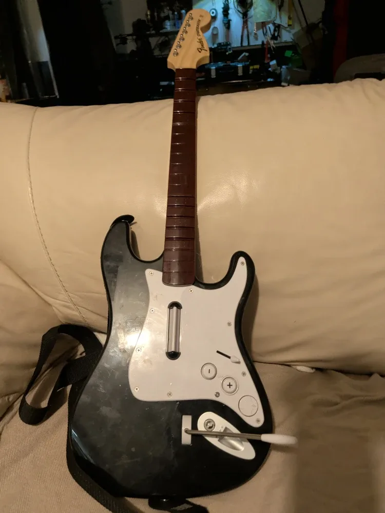 Red Nintendo Wii Console with Games image indicator(3)