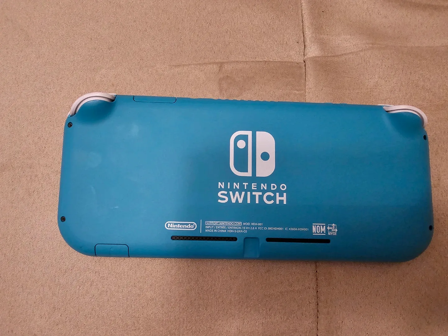 Nintendo Switch Lite (Turquoise) + Zelda Game image indicator(2)
