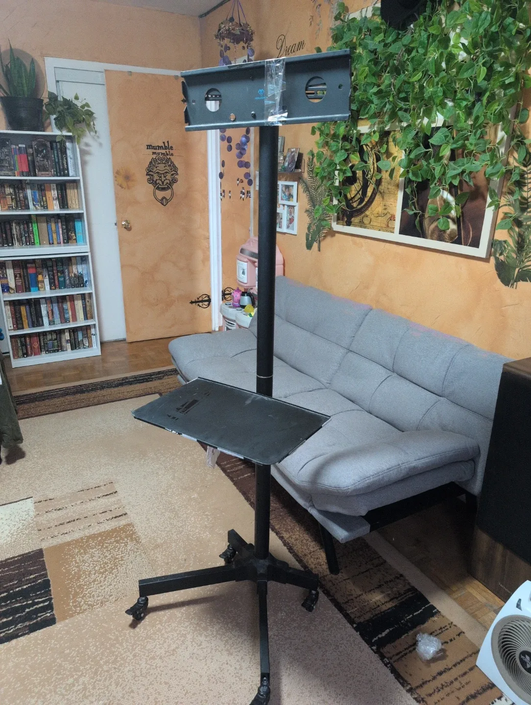 Rolling Height Adjustable TV Stand with shelf.