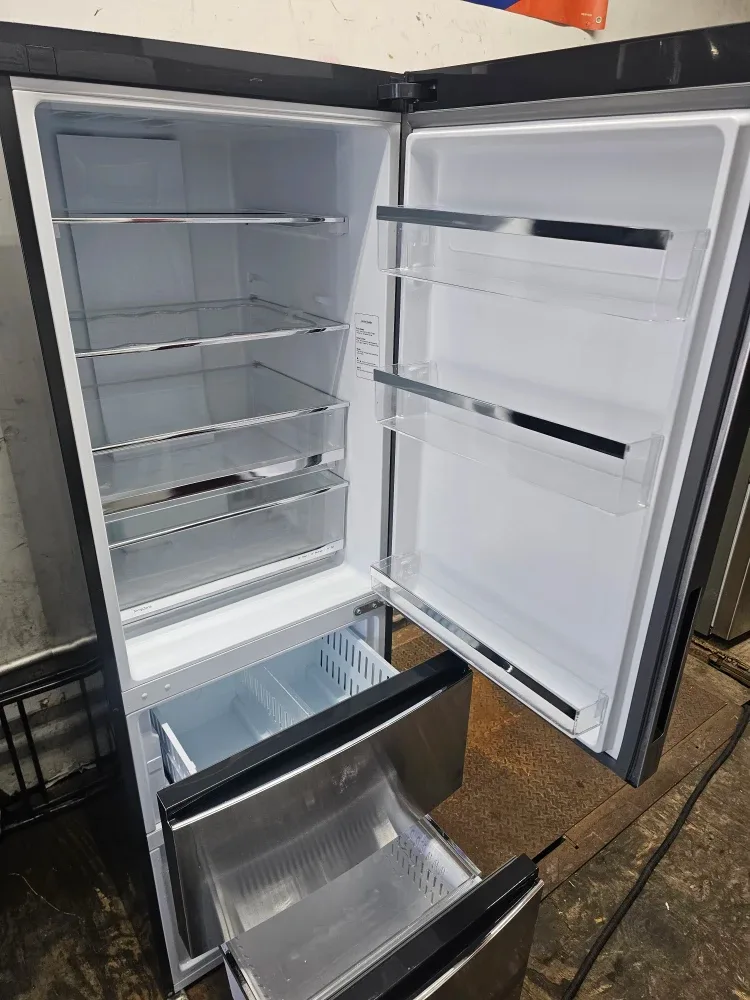 Ge 24in Stainless steel bottom freezer refrigerator image indicator(2)