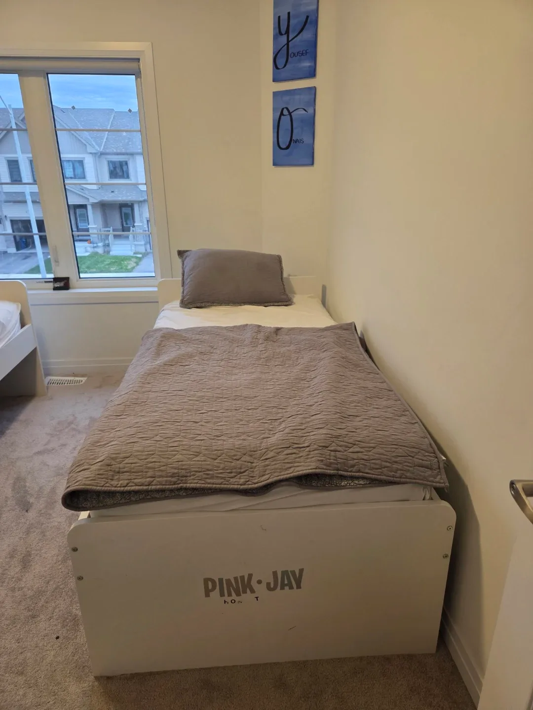2 White Twin Bed Frames, each with a free costco mattress