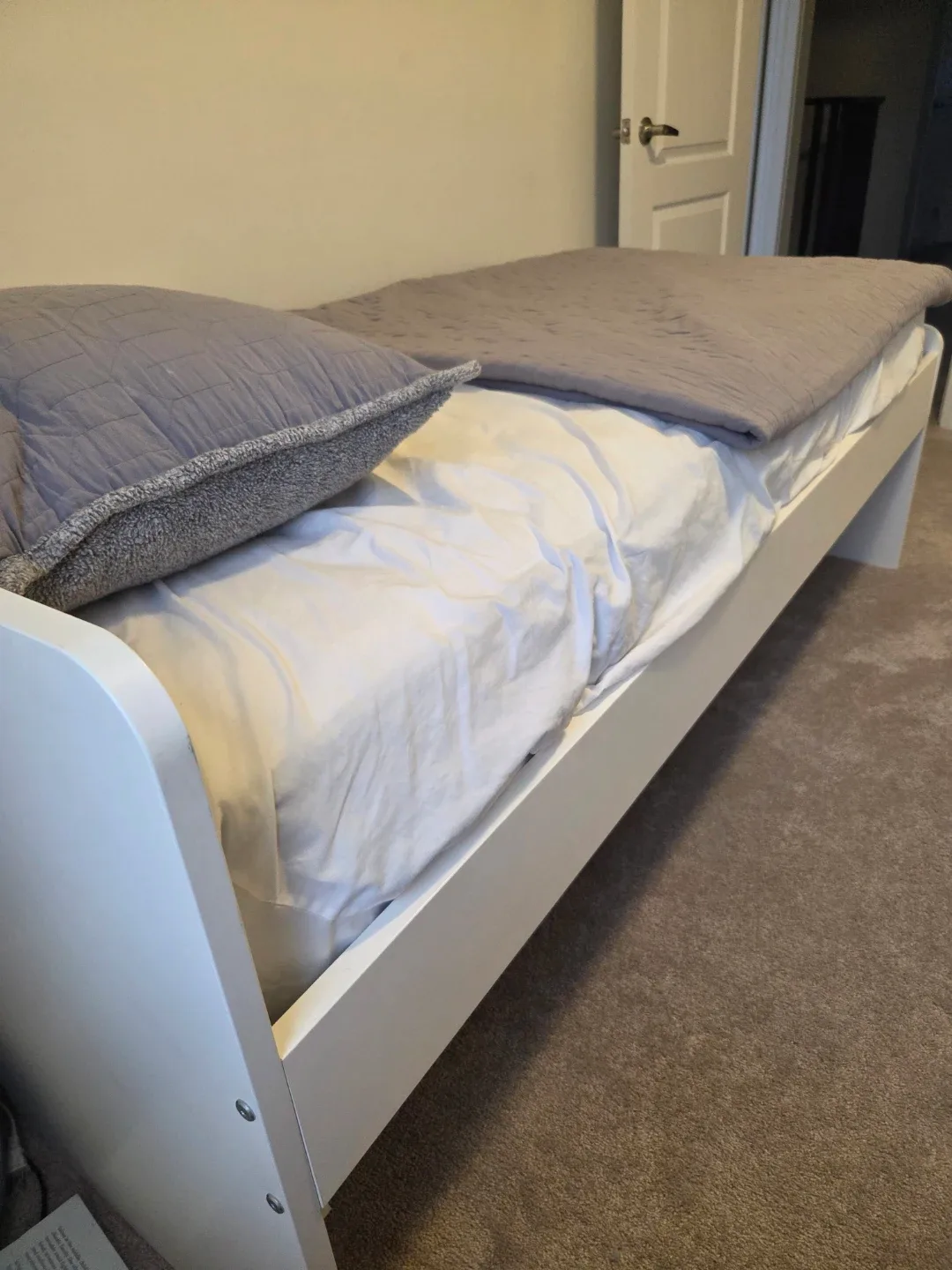 2 White Twin Bed Frames, each with a free costco mattress image indicator(2)