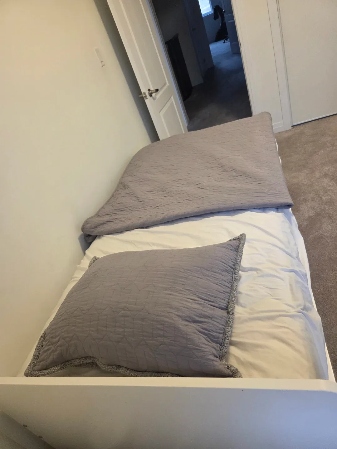 2 White Twin Bed Frames, each with a free costco mattress image indicator(3)