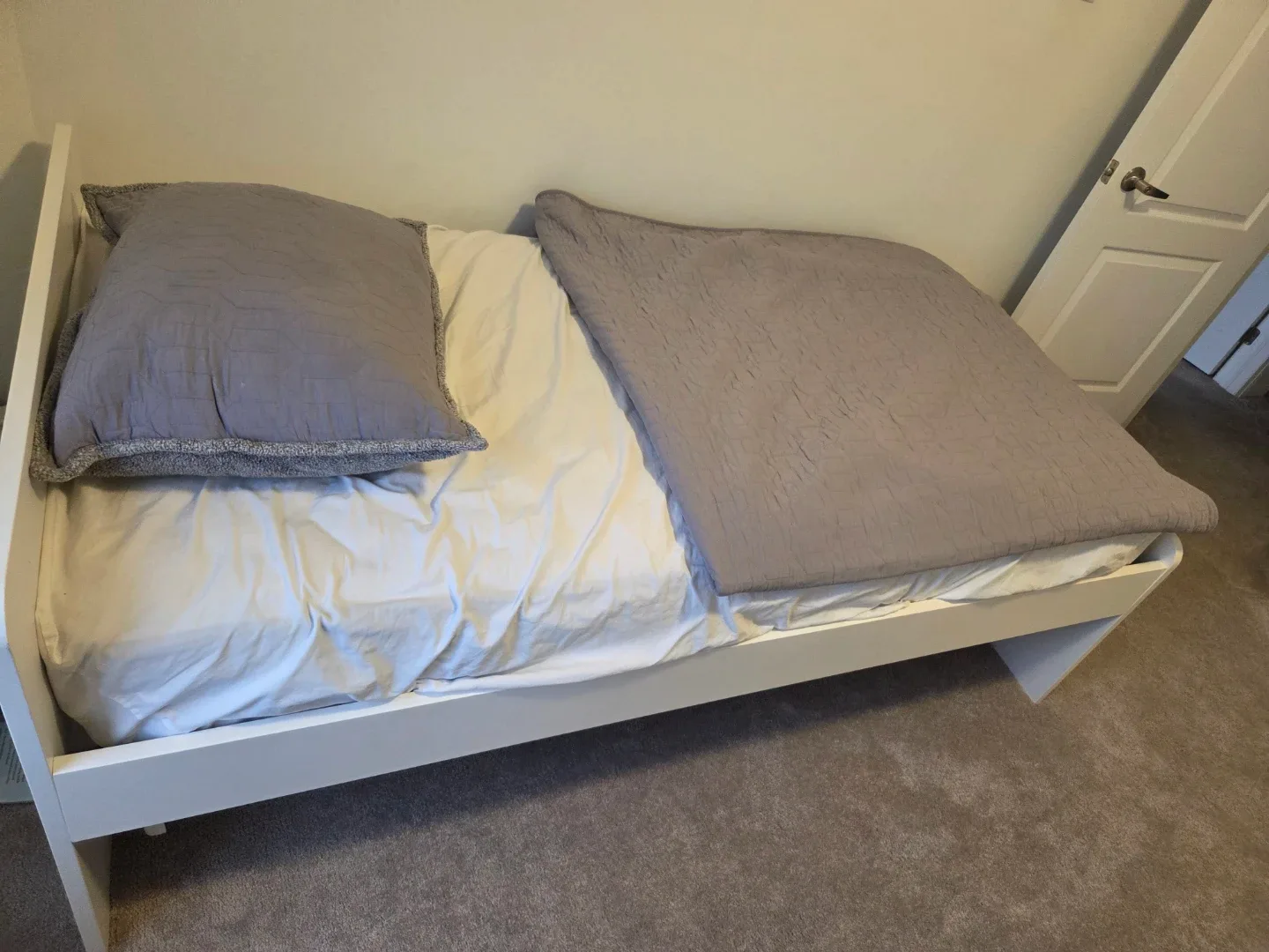 2 White Twin Bed Frames, each with a free costco mattress image indicator(4)