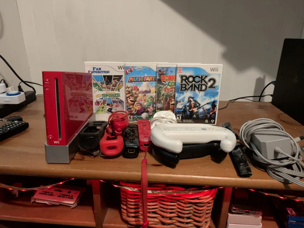 Red Nintendo Wii Console with Games