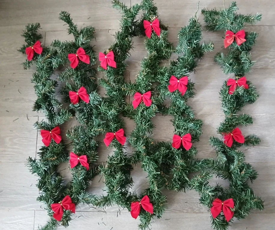 12 ft Christmas Garland with Red Bows available. Firm price.