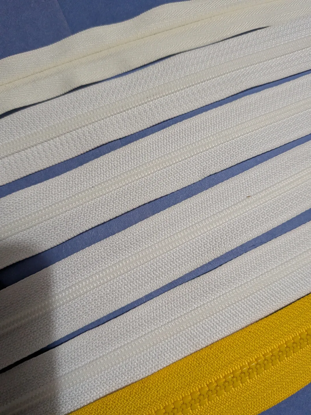 Six Assorted Zippers - White, cream & Yellow image indicator(6)
