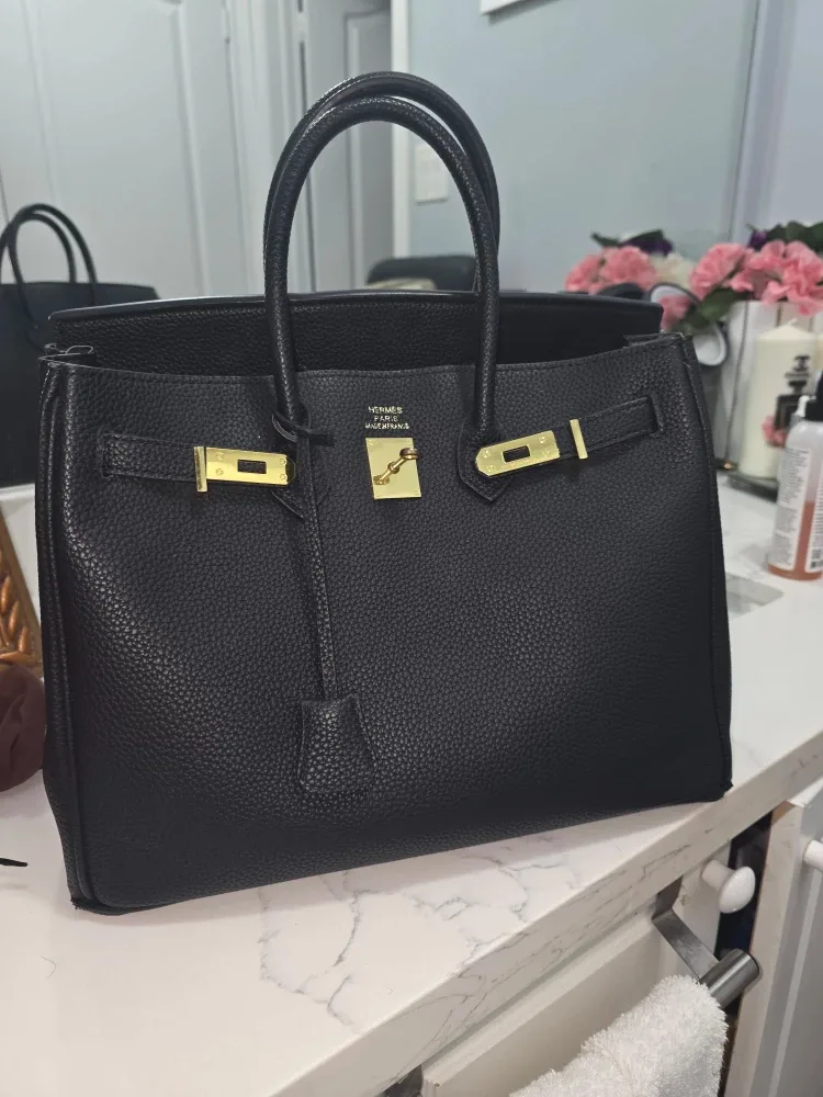 Birkin Black Handbag ($280)