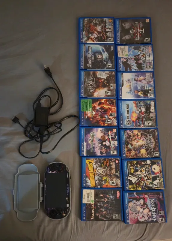 PS Vita with Games and Case