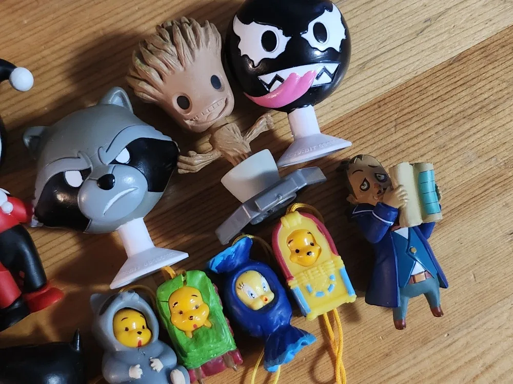 Assorted Collectible Figurines - DC, Marvel, Looney Tunes image indicator(4)