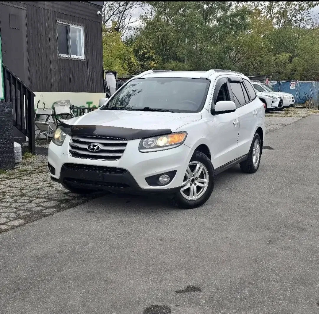 Lease-to-own white Hyundai Santa Fe. image indicator(3)