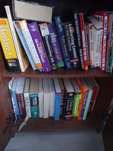 Bookshelf with Assorted Books image indicator(2)