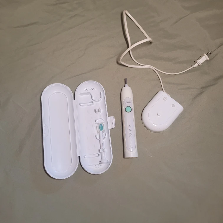 Philips Sonicare Toothbrush with Charger & Case