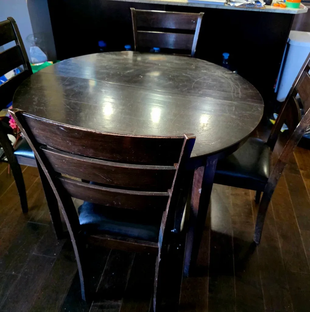 Dark Wood Round Dining Table with 4 Chairs. Expandable image indicator(2)