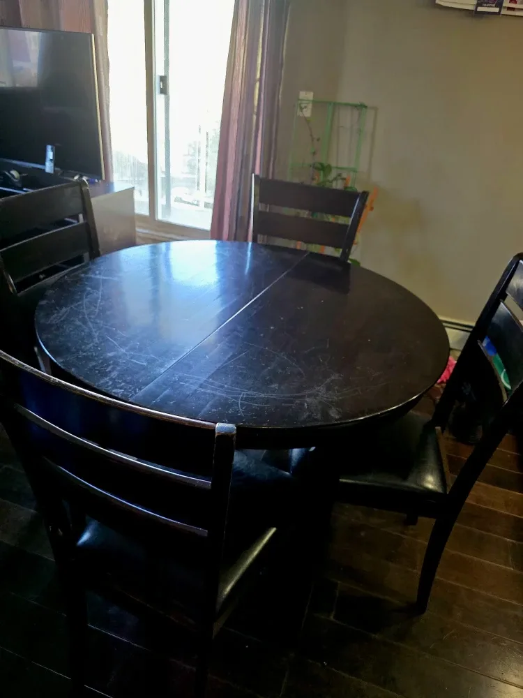 Dark Wood Round Dining Table with 4 Chairs. Expandable image indicator(3)