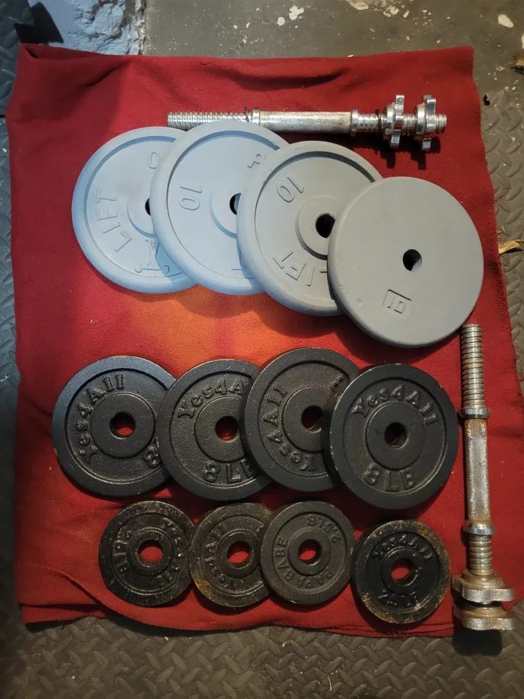 1" HOLE  ADJUSTABLE DUMBBELLS 82LBs.