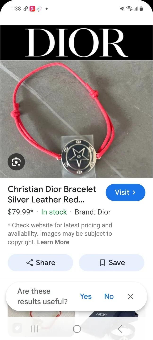 Cristian dior bracelet on red cord image indicator(9)
