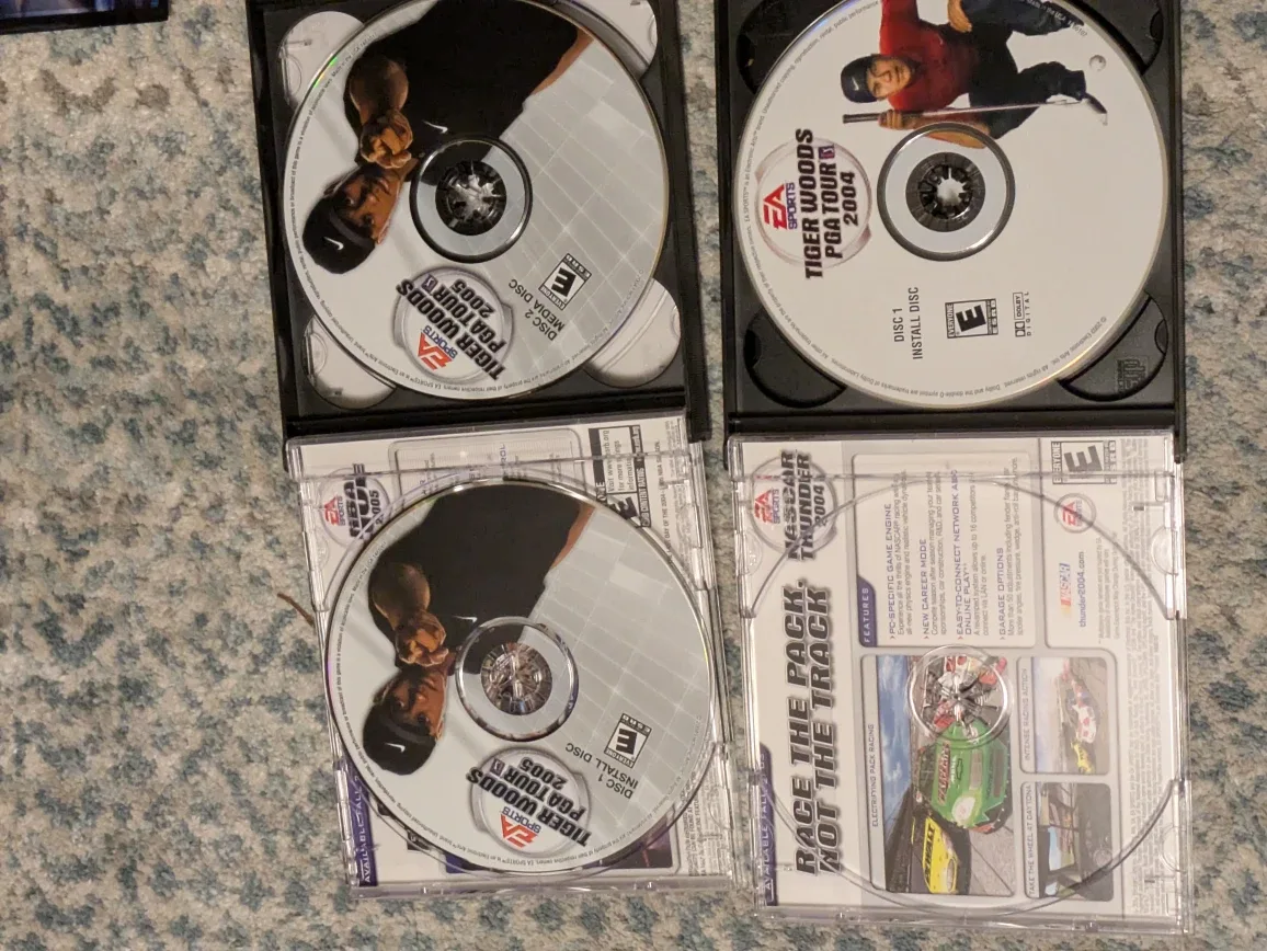 Mixed Lot of PC Games - Tiger Woods PGA Tour, Sims image indicator(6)