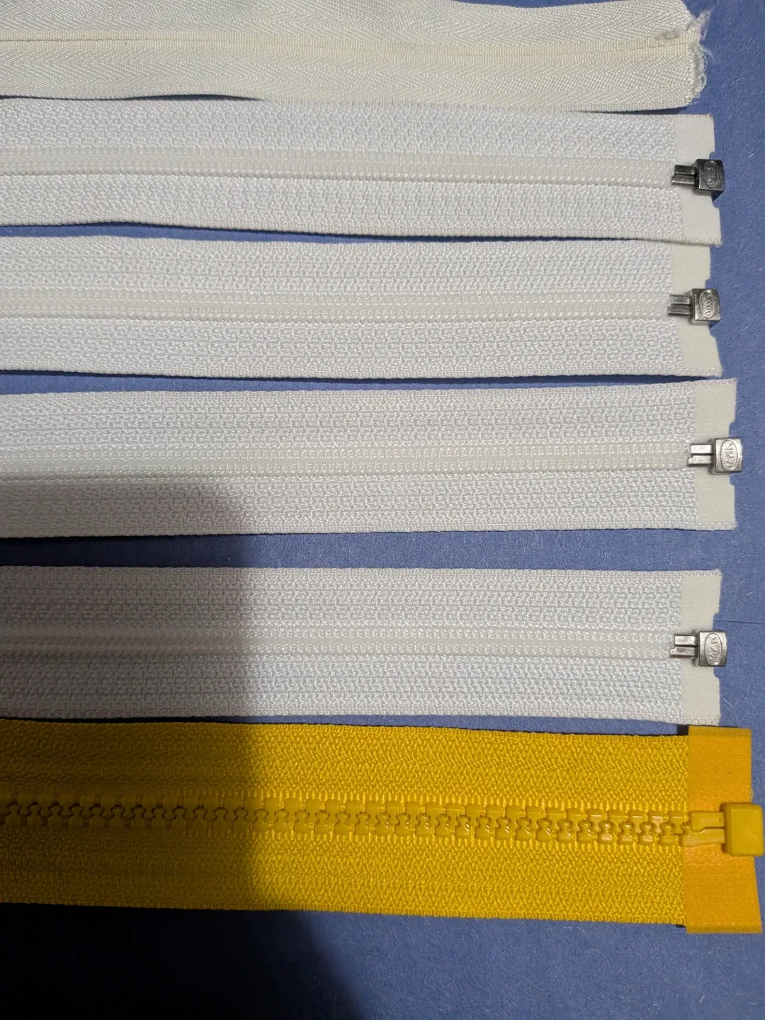 Six Assorted Zippers - White, cream & Yellow image indicator(4)