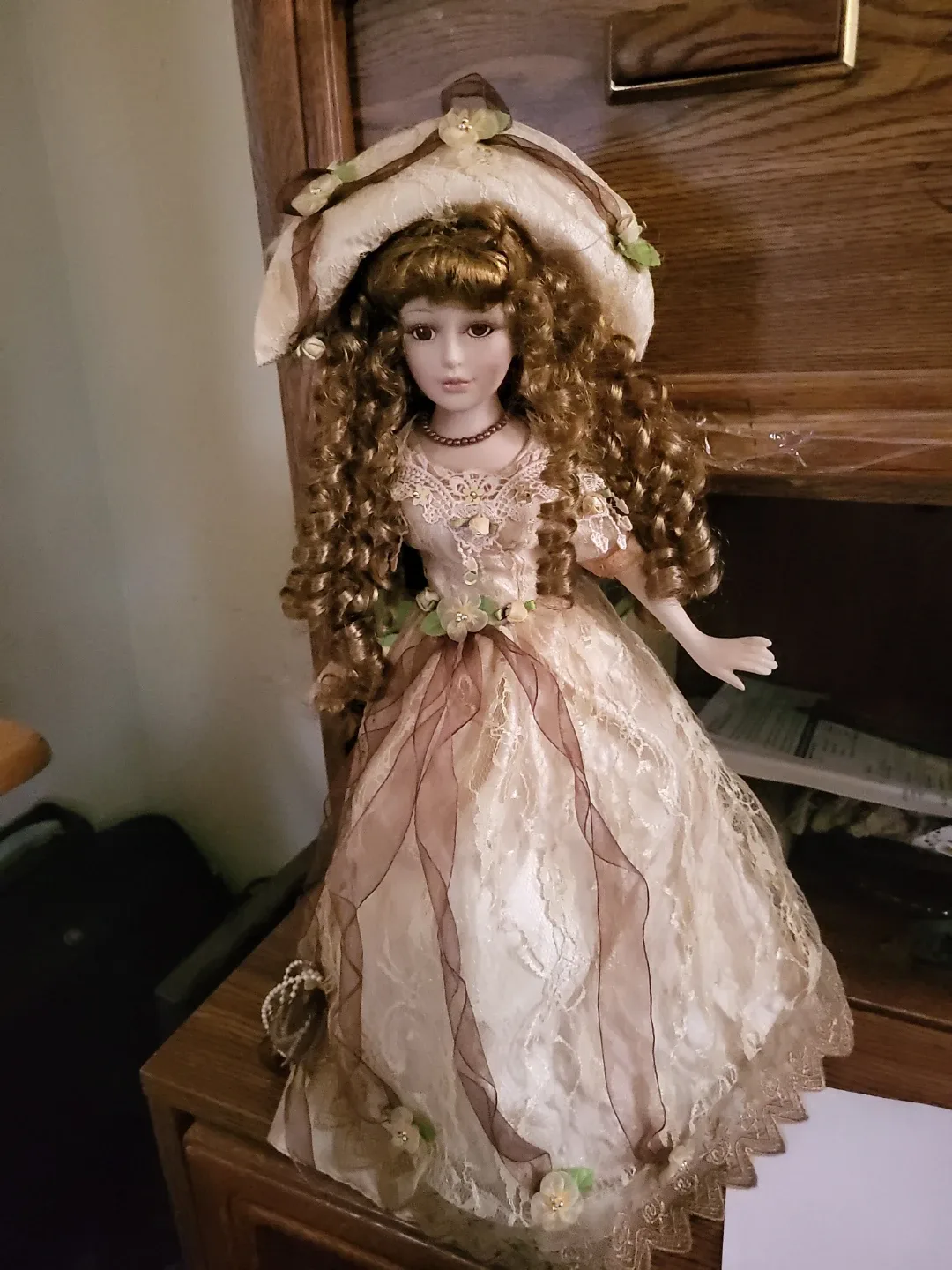 Porcelain Doll with Brown Curls image indicator(2)