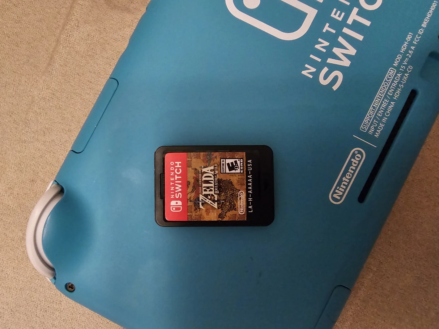 Nintendo Switch Lite (Turquoise) + Zelda Game - photo 3