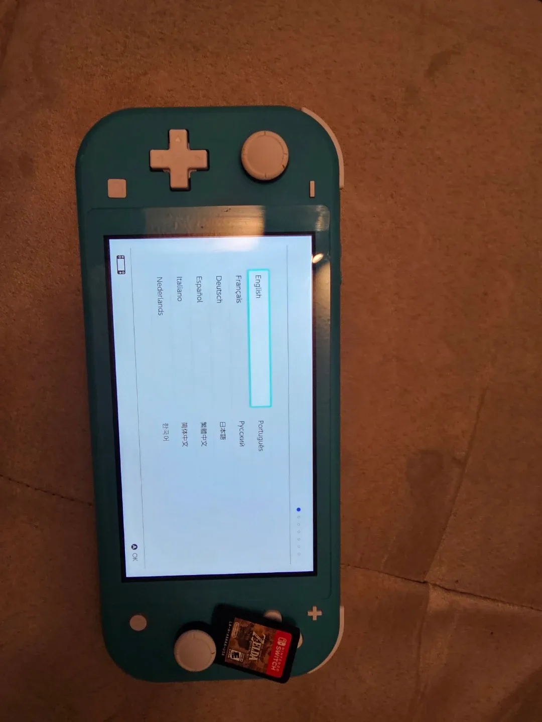 Nintendo Switch Lite (Turquoise) + Zelda Game image indicator(4)
