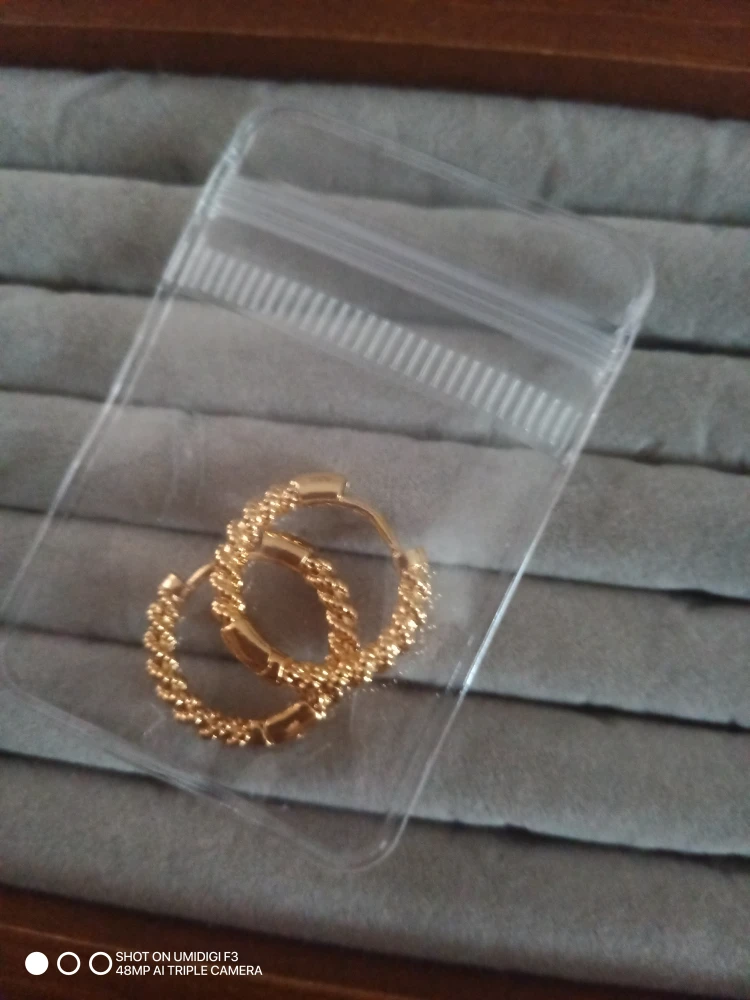 Gold Twisted Hoop Earrings 18K 999
