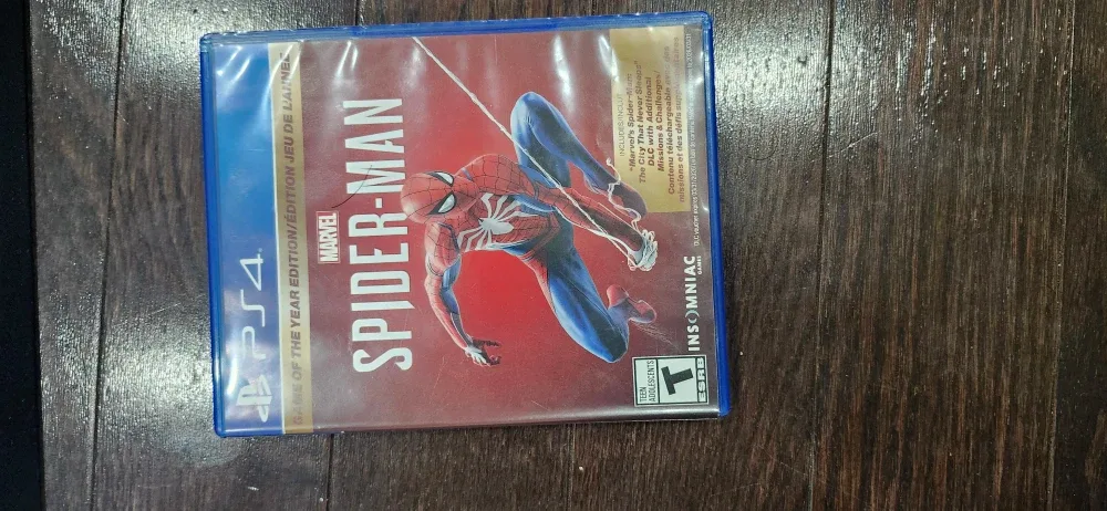 PlayStation 4 Slim with Red Controller & Spider-Man Game image indicator(2)