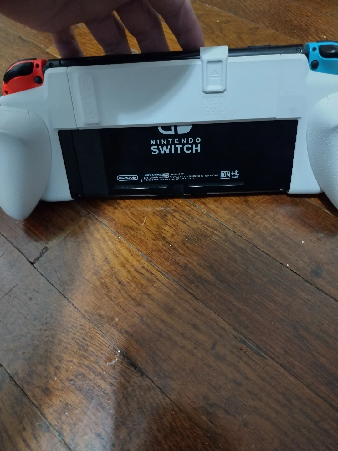 Nintendo Switch with Co Grip and Charger and Pokemon Shield Game image indicator(3)