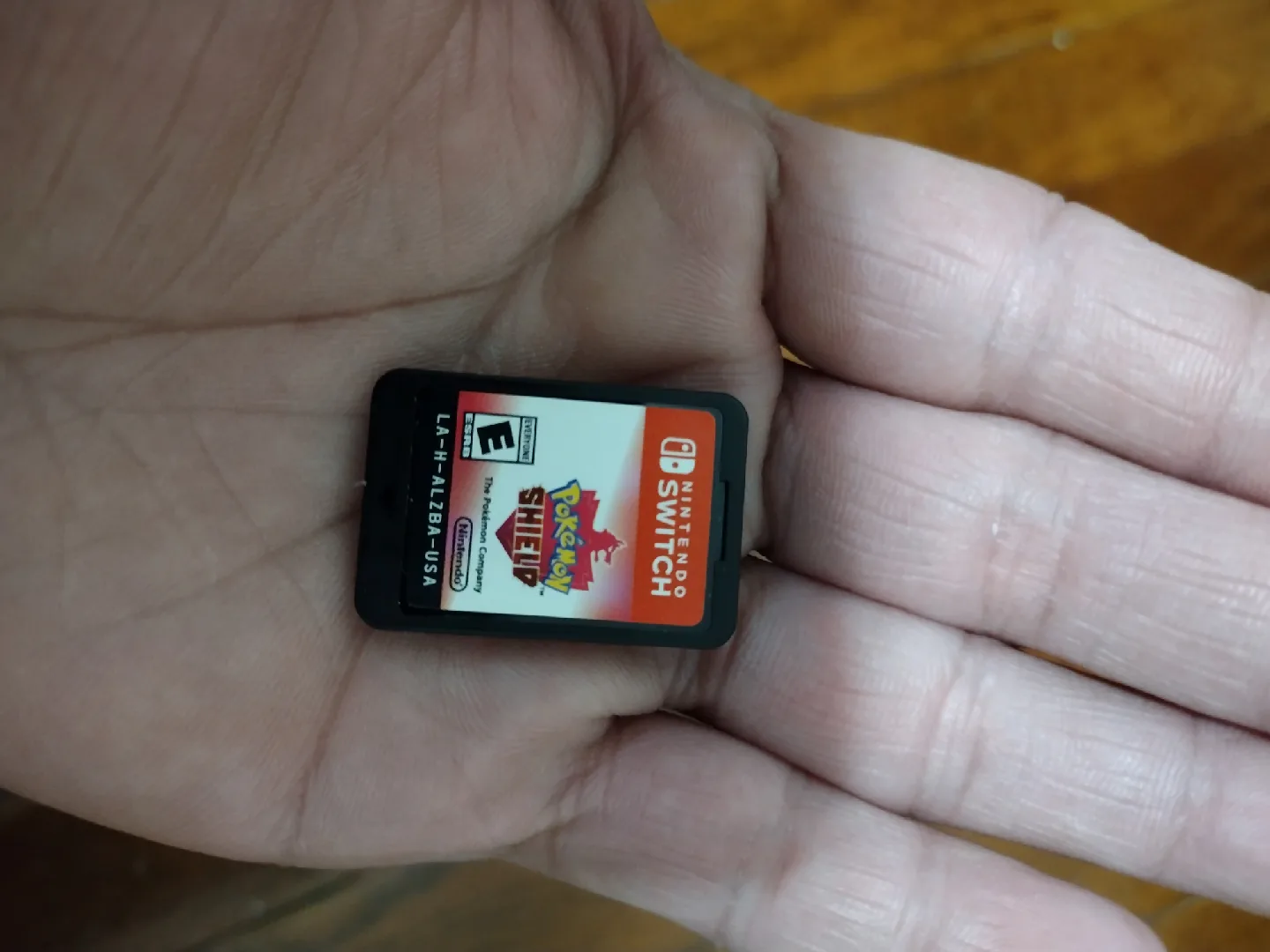 Nintendo Switch with Co Grip and Charger and Pokemon Shield Game image indicator(7)