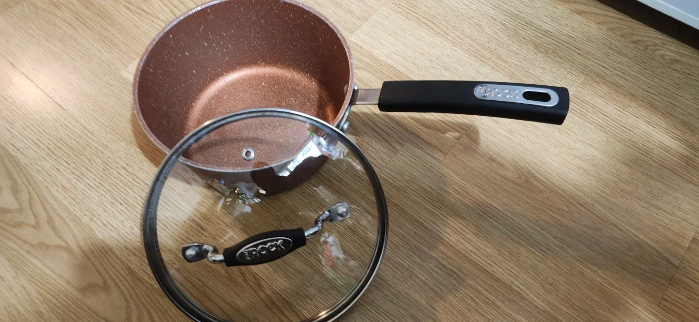 Brock Aluminium Copper-Toned Saucepan with Lid.For Cost new $45+ image indicator(3)