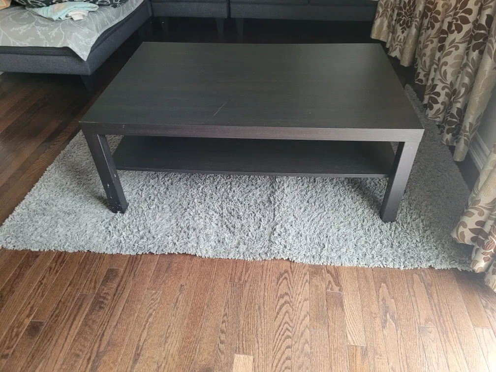 Dark Brown Coffee Table with Shelf and Area Rug