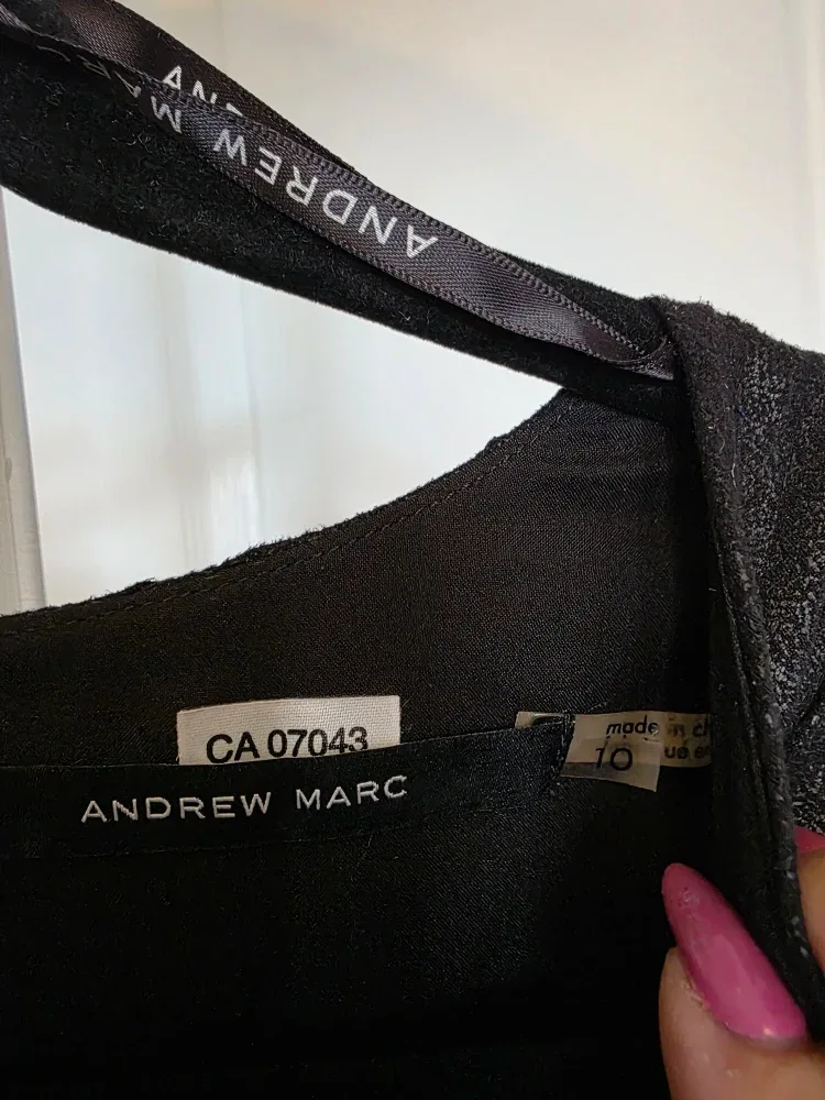 Elegant Little Black Dress By Andrew Marc image indicator(7)