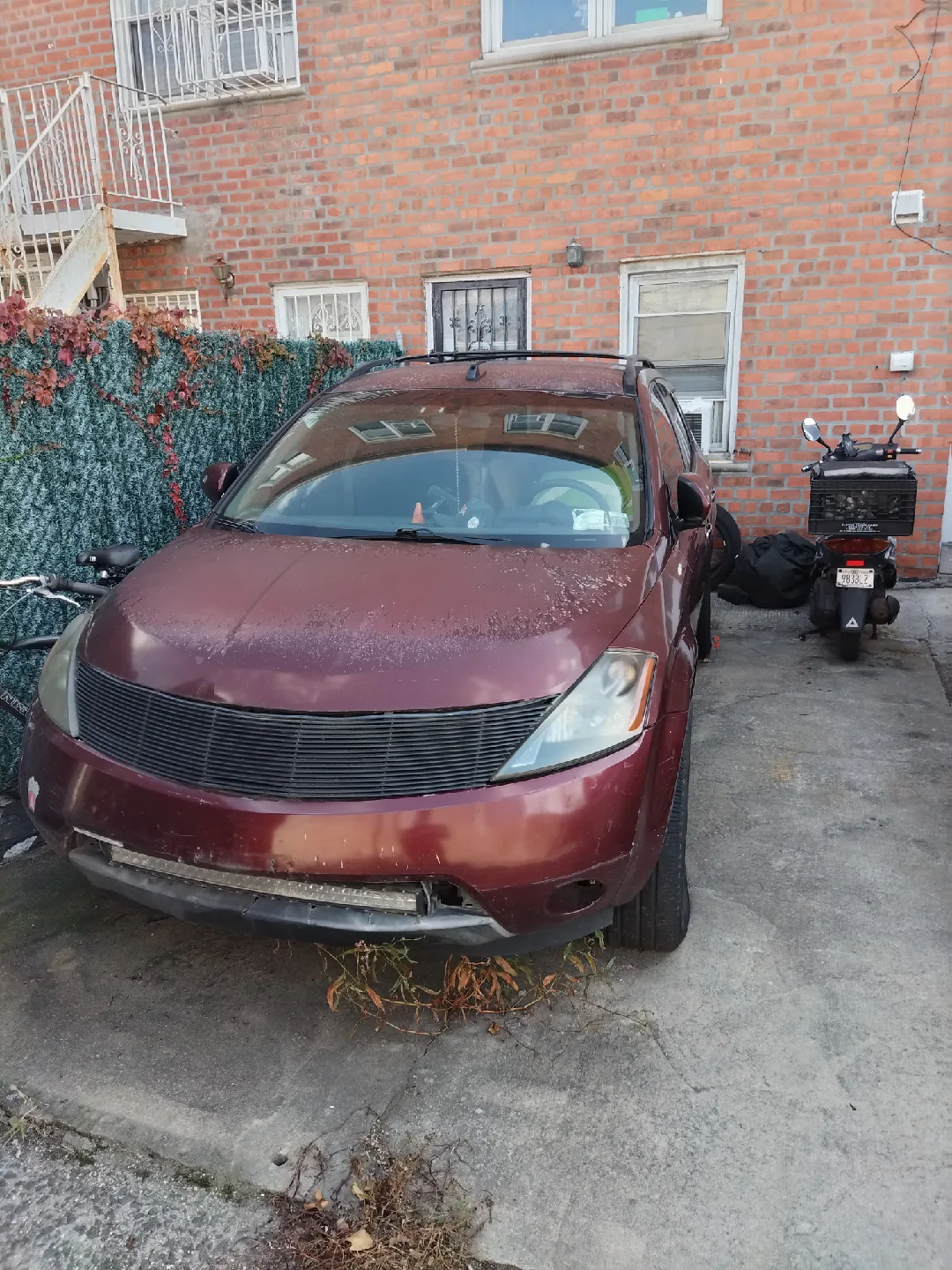 Maroon Nissan Murano image indicator(2)