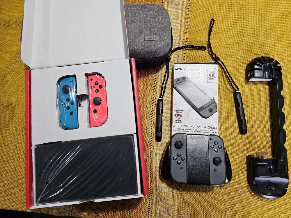 Nintendo Switch OLED bundle w/ accessories - photo 2