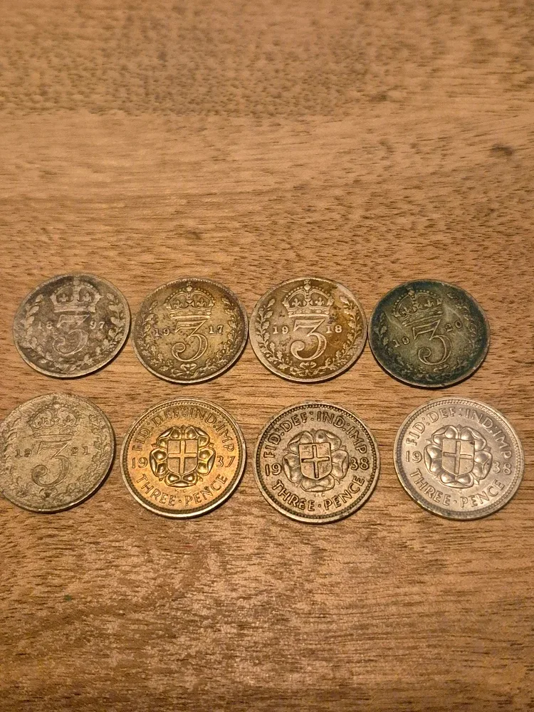 Lot of 8 silver British threepence coins